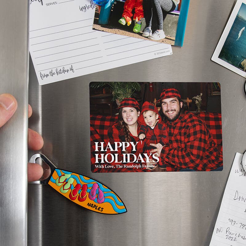 a holiday family photo on a fridge 